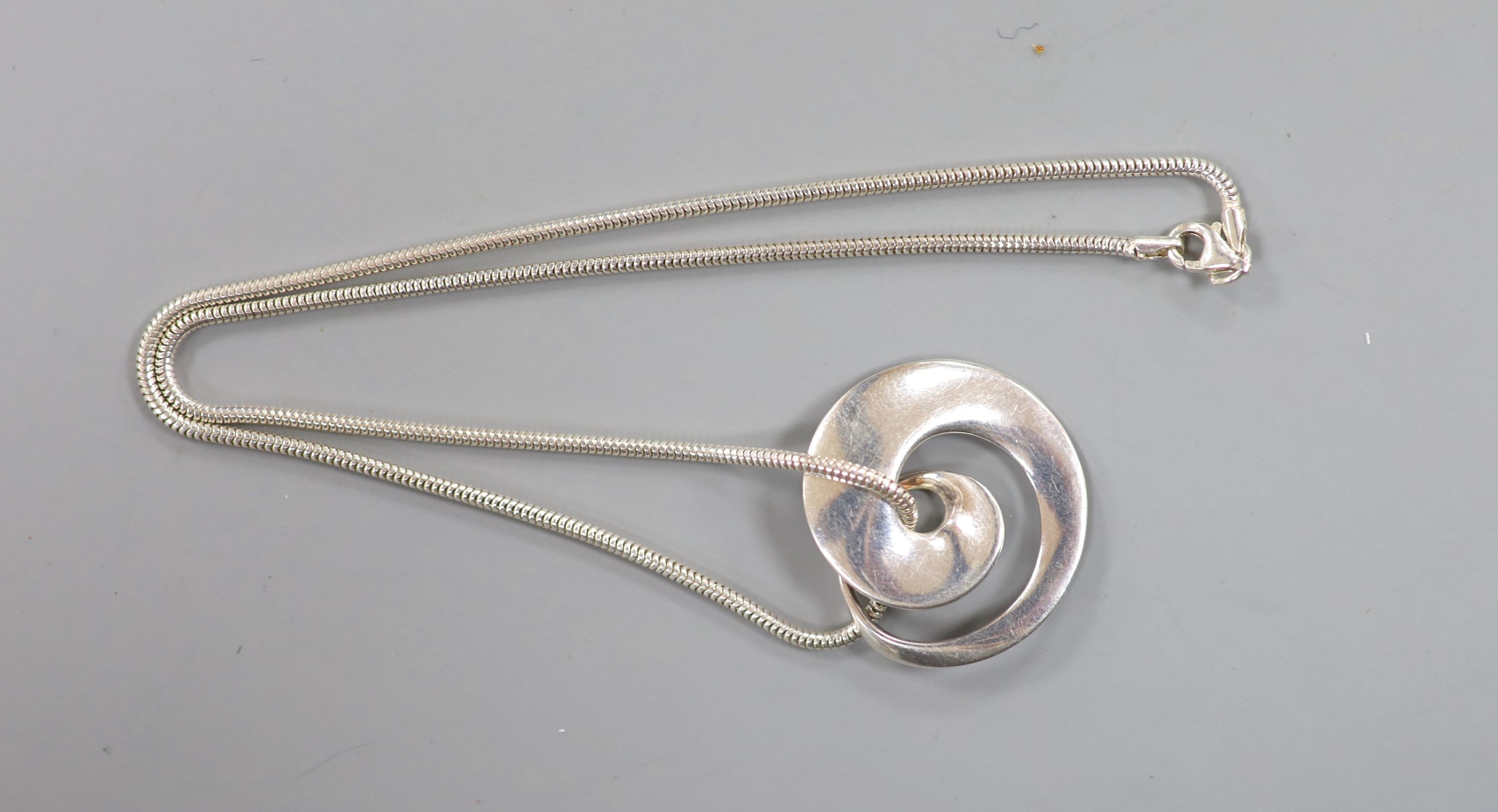 A Vivianna Torun for Georg Jenson sterling continuity pendant, no. 443, 29mm, on an associated silver chain, 40cm.